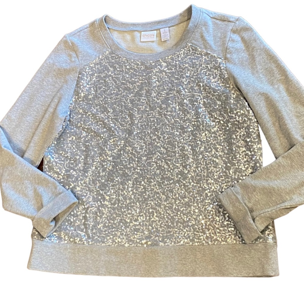 Chico’s ladies Size 1 Silver Sequin Front Gray Sweatshirt with rolled sleeves.